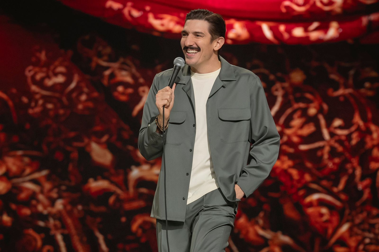 Andrew Schulz performing on the Life special set