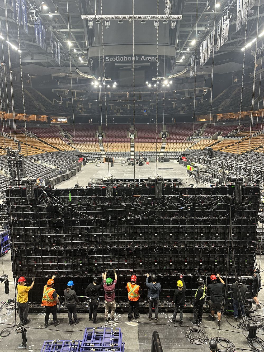 Crew building the LED video wall during load-in at Scotiabank Arena